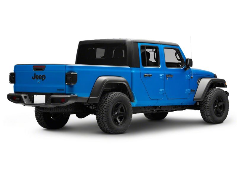 Load image into Gallery viewer, Raxiom 20-23 Jeep Gladiator JT w/ Factory Halogen LED Tail Lights- Blk Housing (Smoked Lens)
