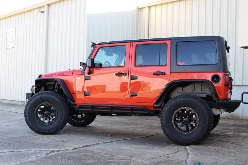 Load image into Gallery viewer, Fishbone Offroad 07-18 Jeep JK 4 Door Wrangler JK Steel Rock Sliders - Blk Textured Powdercoat
