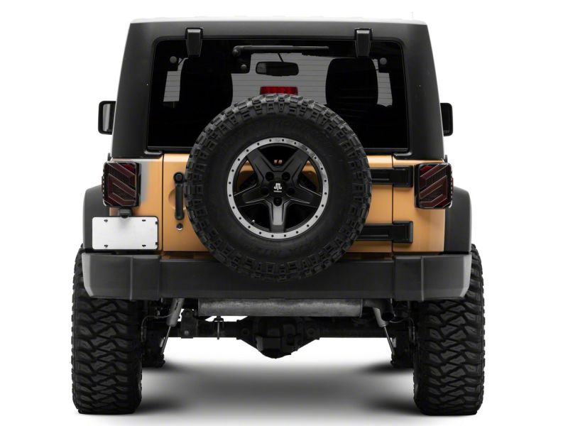 Load image into Gallery viewer, Raxiom 07-18 Jeep Wrangler JK Axial Series Trident LED Tail Lights- Blk Housing (Clear Lens)
