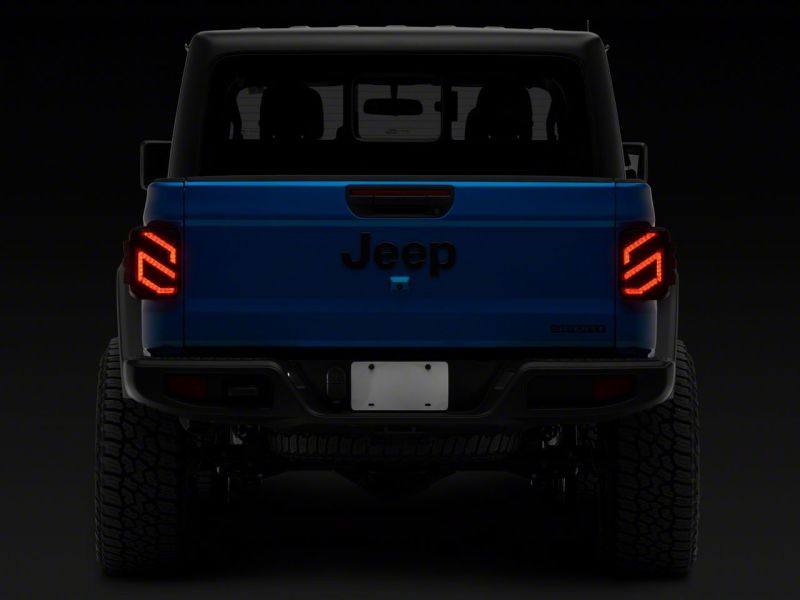 Load image into Gallery viewer, Raxiom 20-23 Jeep Gladiator JT Axial Series LED Tail Lights- Blk Housing (Smoked Lens)
