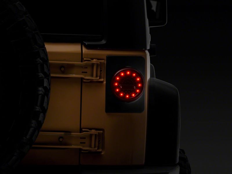 Load image into Gallery viewer, Raxiom 07-18 Jeep Wrangler JK Axial Series Halo LED Tail Lights- Blk Housing (Clear Lens)
