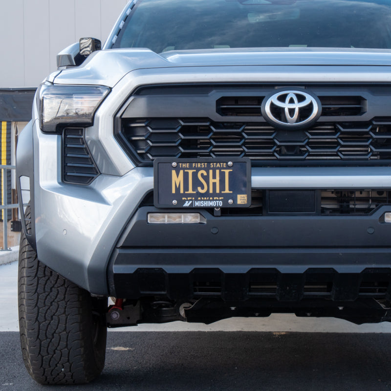 Load image into Gallery viewer, Mishimoto 2024+ Toyota Tacoma License Plate Relocation Kit
