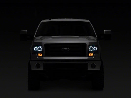 Raxiom 09-14 Ford F-150 Super White LED Halo Projector Headlights- Blk Housing (Clear Lens)