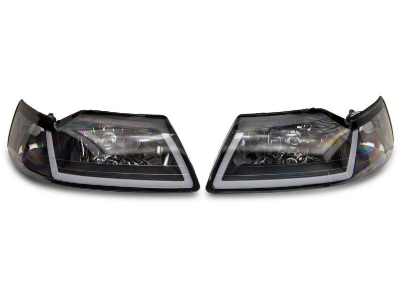 Load image into Gallery viewer, Raxiom 99-04 Ford Mustang Axial Series Headlights w/ Sequential LED Bar- Blk Housing (Clear Lens)
