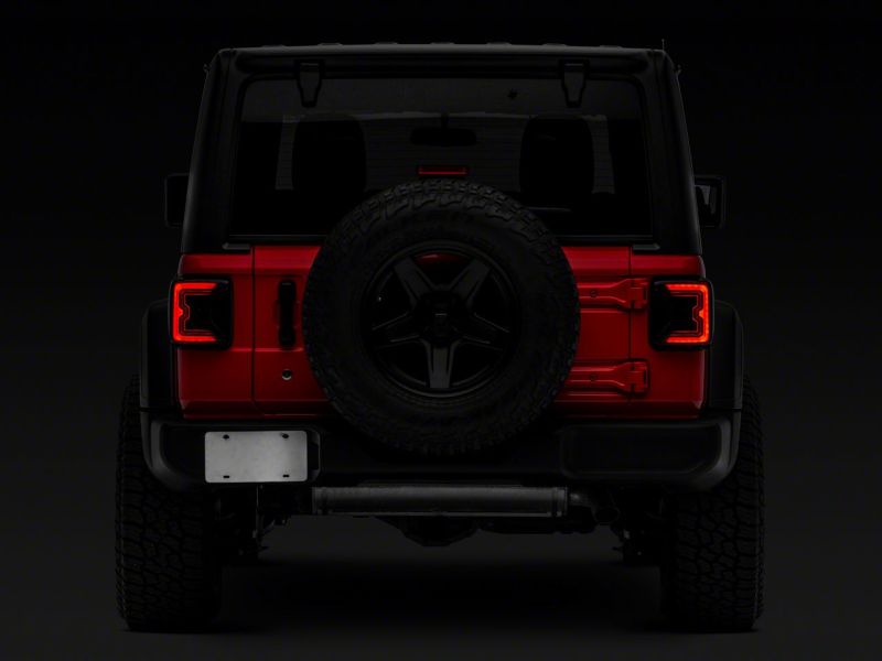 Load image into Gallery viewer, Raxiom 18-23 Jeep Wrangler JL Axial Series LED Tail Lights- Blk Housing (Smoked Lens)
