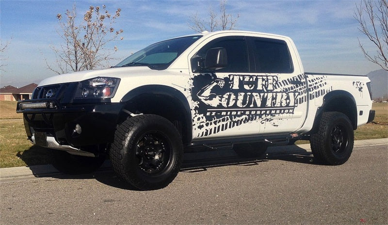 Load image into Gallery viewer, Tuff Country 04-15 Nissan Titan 4wd 4in Lift Kit (No Shocks)
