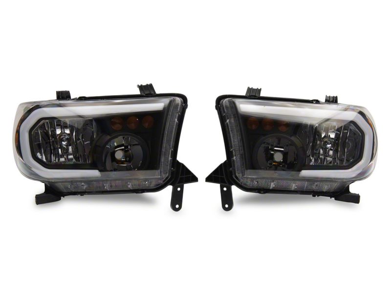 Load image into Gallery viewer, Raxiom 07-13 Toyota Tundra Axial Series Headlights w/ SEQL LED Bar- Black Housing (Clear Lens)
