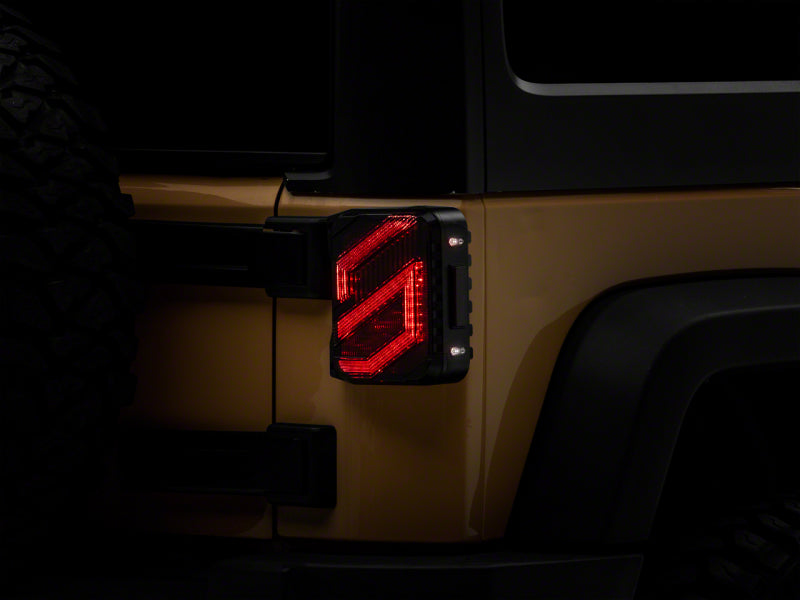 Load image into Gallery viewer, Raxiom 07-18 Jeep Wrangler JK Axial Series Trident LED Tail Lights- Blk Housing (Smoked Lens)
