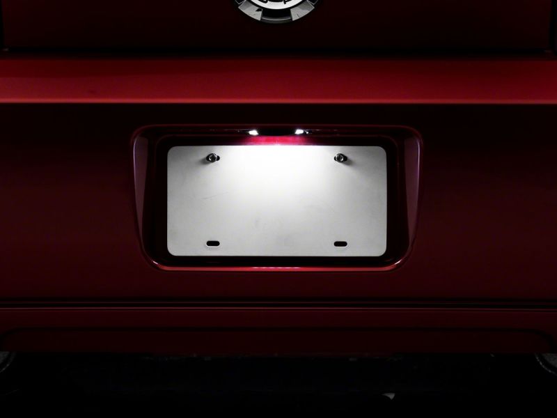 Load image into Gallery viewer, Raxiom 05-09 Ford Mustang Axial Series LED License Plate Lamps
