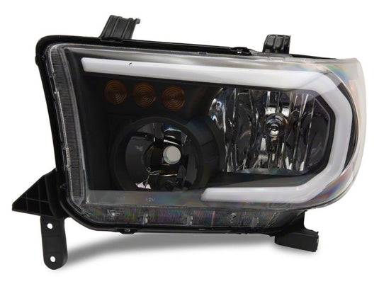 Raxiom 07-13 Toyota Tundra Axial Series Headlights w/ SEQL LED Bar- Black Housing (Clear Lens)