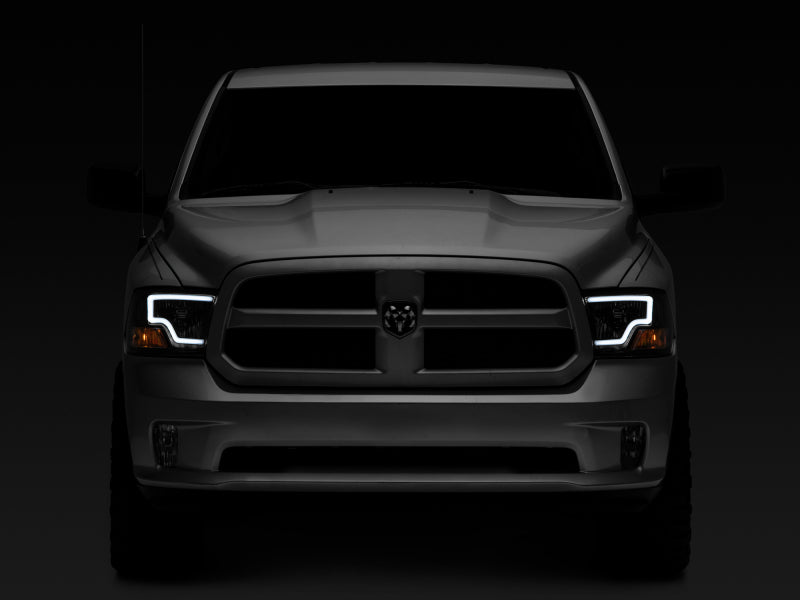 Load image into Gallery viewer, Raxiom 09-18 Dodge RAM 1500 LED Bar Headlights- Black Housing (Clear Lens)
