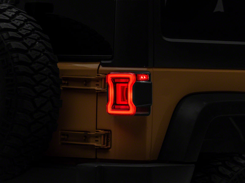 Load image into Gallery viewer, Raxiom 07-18 Jeep Wrangler JK Axial Series JL Style LED Tail Lights- BlkHousing- Red Lens
