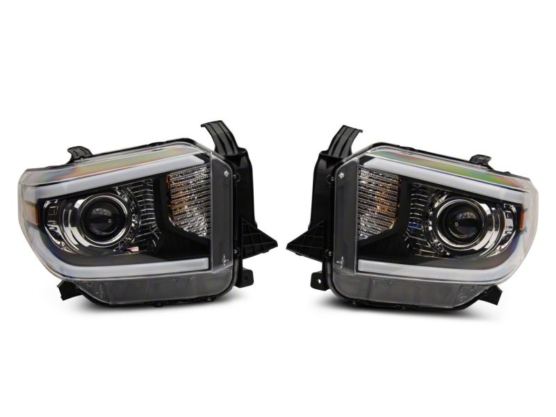 Load image into Gallery viewer, Raxiom 14-21 Toyota Tundra Axial Projector Headlights w/ SEQL LED Bar- Blk Housing (Clear Lens)
