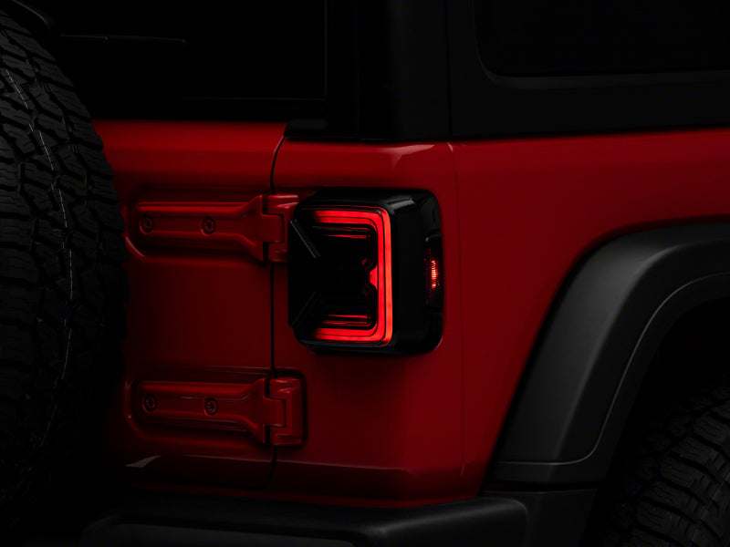 Load image into Gallery viewer, Raxiom 18-23 Jeep Wrangler JL Axial Series LED Tail Lights- Blk Housing (Smoked Lens)
