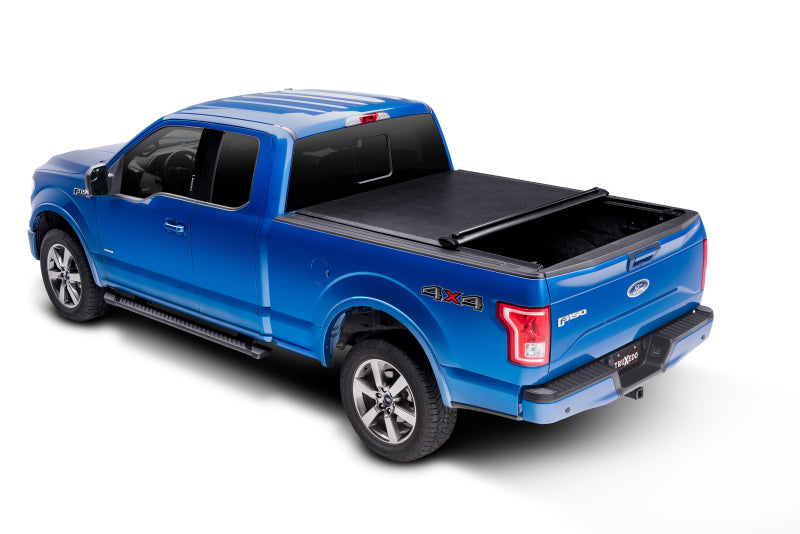 Load image into Gallery viewer, Truxedo 05-15 Nissan Navara w/Rack 4ft 10in Lo Pro International Bed Cover
