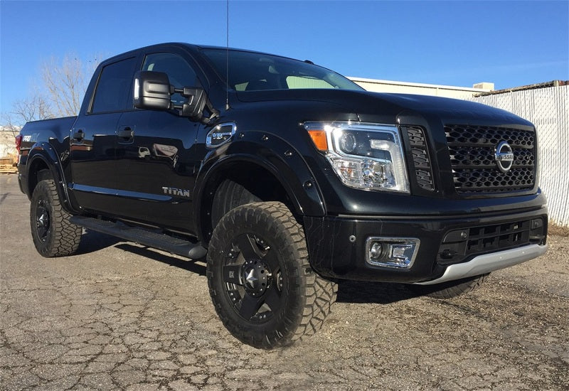 Load image into Gallery viewer, Tuff Country 17-23 Nissan Titan 4x4 (Non XD model) 4in Uni-Ball Lift Kit (SX8000 Shocks)
