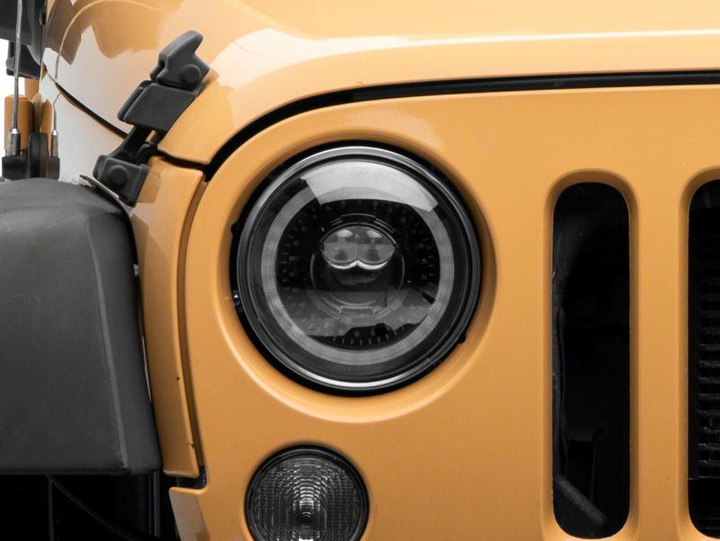 Load image into Gallery viewer, Raxiom 07-18 Jeep Wrangler JK Axial Series 7-In Dragon Eye LED Headlights- Blk Housing (Clear Lens)
