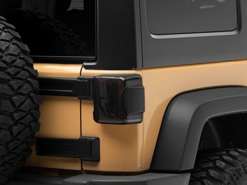 Load image into Gallery viewer, Raxiom 07-18 Jeep Wrangler JK Axial Series LED Tail Lights- Blk Housing (Smoked Lens)
