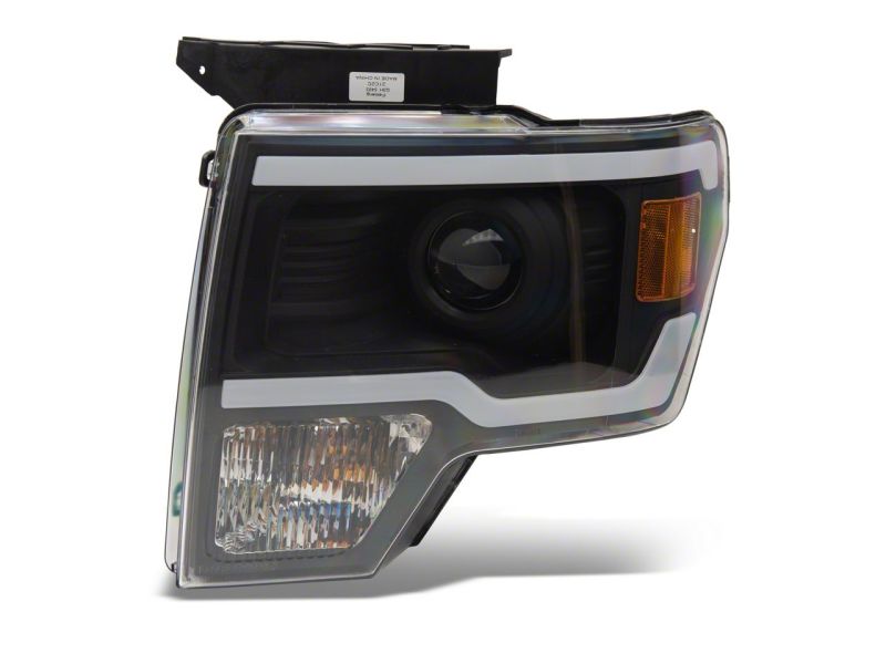 Load image into Gallery viewer, Raxiom 09-14 Ford F-150 Axial Series Projector Headlights w/ LED Light Bar- Blk Housing (Clear Lens)
