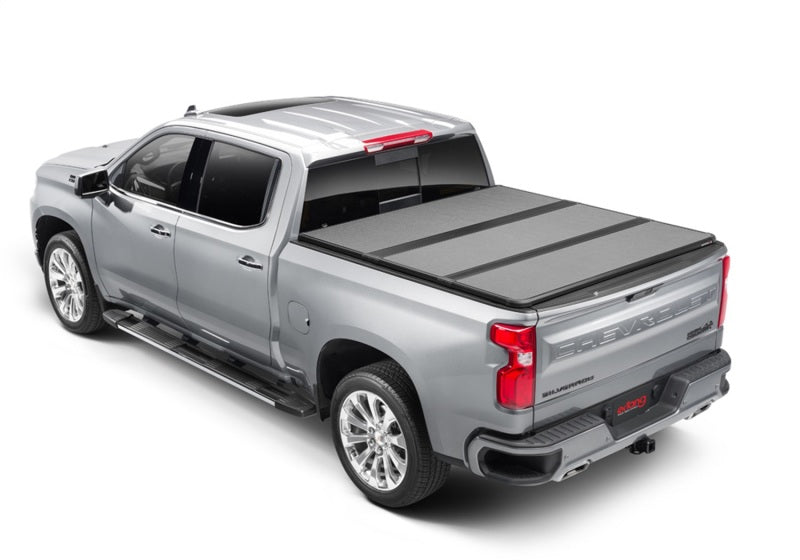 Load image into Gallery viewer, Extang 19-23 Chevy/GMC Silverado/Sierra 1500 (8ft. 2in. Bed) Solid Fold ALX
