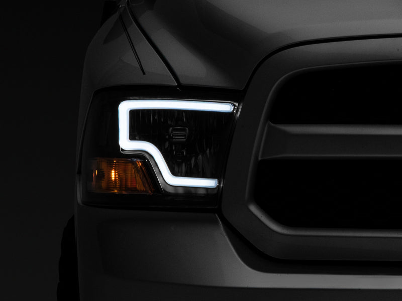 Load image into Gallery viewer, Raxiom 09-18 Dodge RAM 1500 LED Bar Headlights- Black Housing (Clear Lens)
