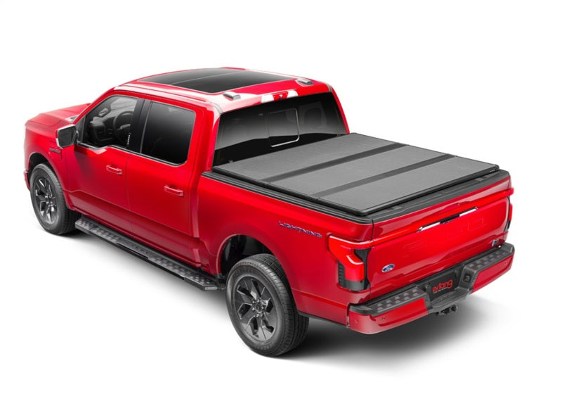 Load image into Gallery viewer, Extang 21-23 Ford F-150 (5ft. 7in. Bed) Solid Fold ALX
