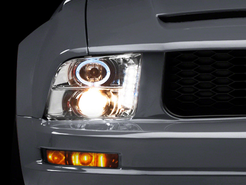 Load image into Gallery viewer, Raxiom 05-09 Ford Mustang Excluding GT500 LED Halo Projector Headlights- Chrome Housing (Clear Lens)
