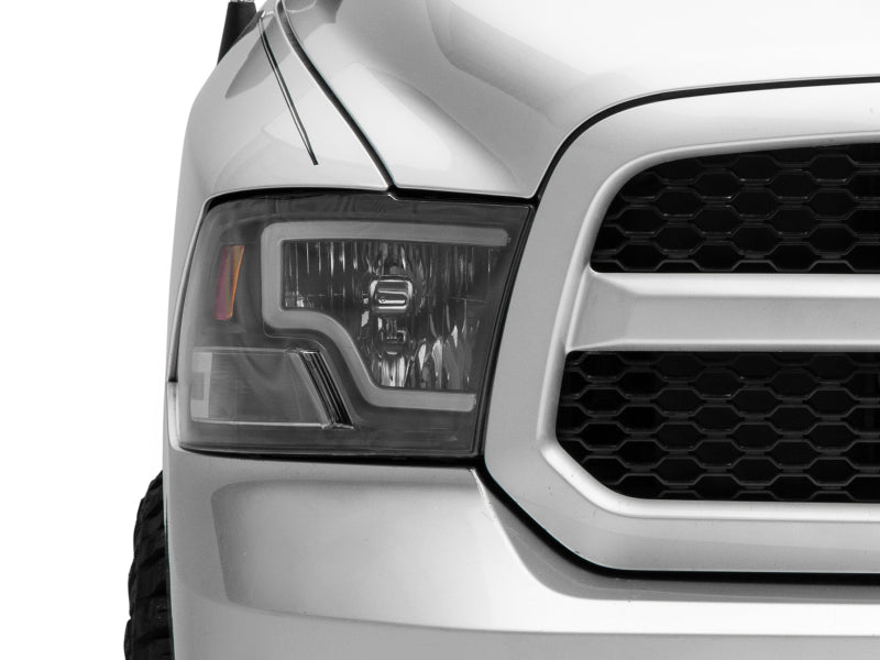 Load image into Gallery viewer, Raxiom 09-18 Dodge RAM 1500 LED Bar Headlights- Black Housing (Clear Lens)
