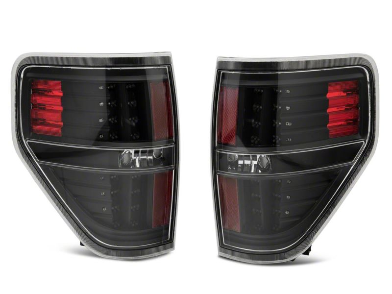 Load image into Gallery viewer, Raxiom 09-14 Ford F-150 Styleside LED Tail Lights- Blk Housing (Clear Lens)
