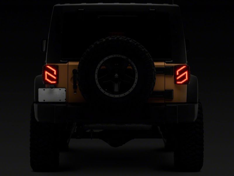 Load image into Gallery viewer, Raxiom 07-18 Jeep Wrangler JK Axial Series Trident LED Tail Lights- Blk Housing (Smoked Lens)
