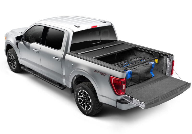 Load image into Gallery viewer, Roll-N-Lock 2024 Ford Ranger 5ft Bed Cargo Manager
