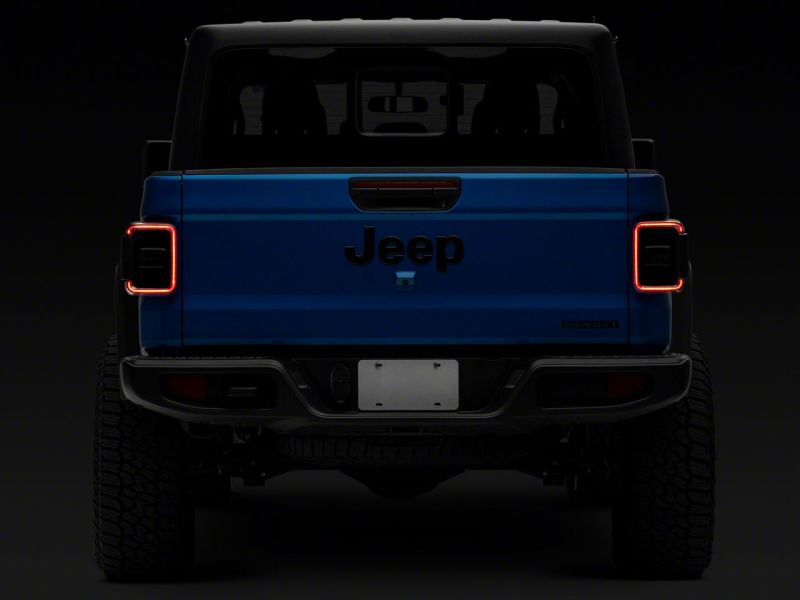 Load image into Gallery viewer, Raxiom 20-23 Jeep Gladiator JT Axial Series LED Tail Lights- Blk Housing (Smoked Lens)
