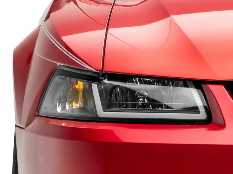 Load image into Gallery viewer, Raxiom 99-04 Ford Mustang Axial Series Headlights w/ LED Bar- Black Housing (Clear Lens)
