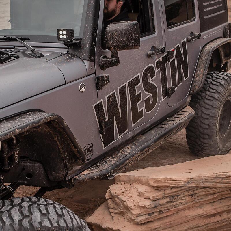 Load image into Gallery viewer, Westin/Snyper 07-17 Jeep Wrangler Unlimited Triple Tube Rock Rail Steps - Textured Black
