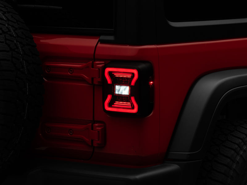 Load image into Gallery viewer, Raxiom 18-22 Jeep Wrangler JL LED Tail Lights- Black Housing - Red Lens
