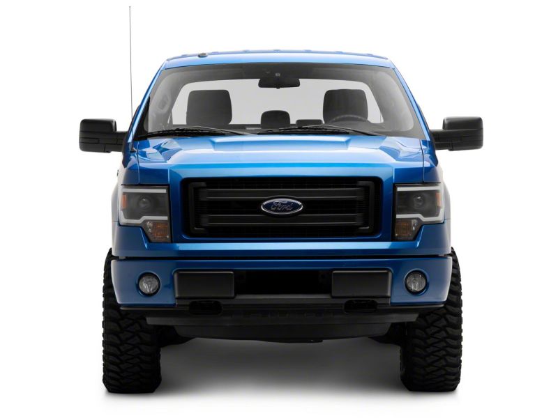 Load image into Gallery viewer, Raxiom 09-14 Ford F-150 Axial Series Projector Headlights w/ LED Light Bar- Blk Housing (Clear Lens)
