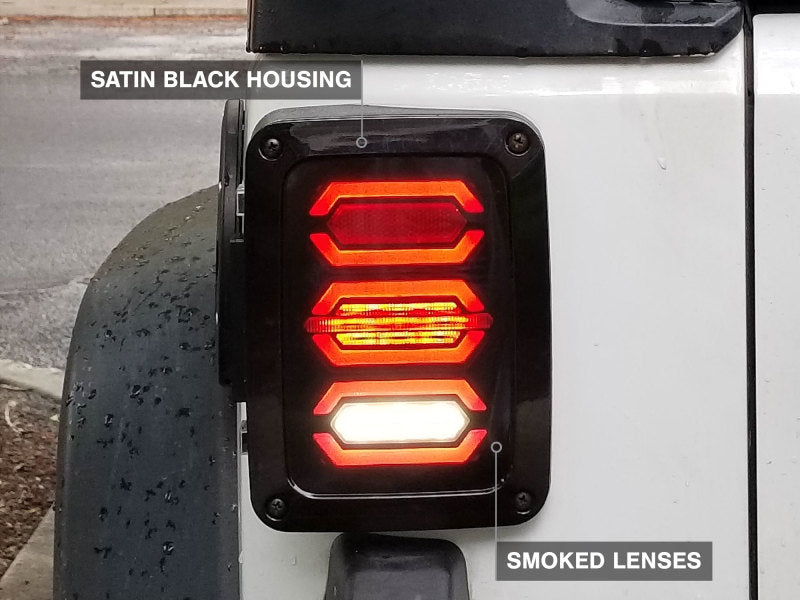 Load image into Gallery viewer, Raxiom 07-18 Jeep Wrangler JK LED Tail Lights- Black Housing (Smoked Lens)
