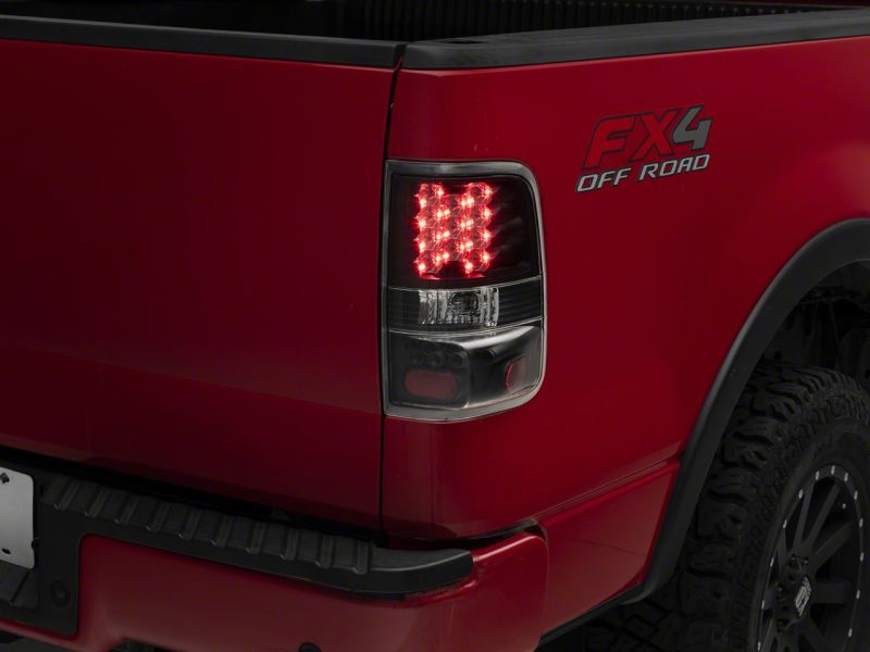 Load image into Gallery viewer, Raxiom 04-08 Ford F-150 Styleside LED Tail Lights- Blk Housing (Clear Lens)
