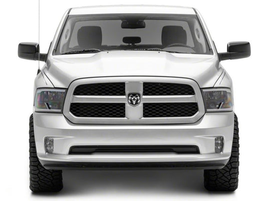 Raxiom 09-18 Dodge RAM 1500/2500/3500 Axial Headlights w/ SEQL LED Bar- Blk Housing (Clear Lens)