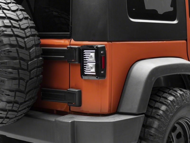 Load image into Gallery viewer, Raxiom 07-18 Jeep Wrangler JK Axial Series Vision LED Tail Lights- Blk Housing (Clear Lens)
