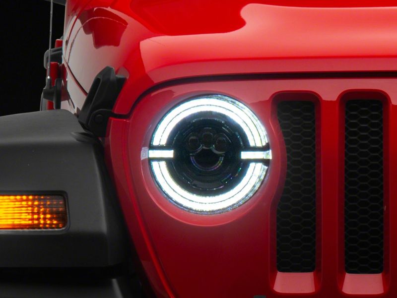 Load image into Gallery viewer, Raxiom 18-23 Jeep Wrangler JL Axial Series 9-In LED Angel Eye Headlights- Blk Housing (Clear Lens)
