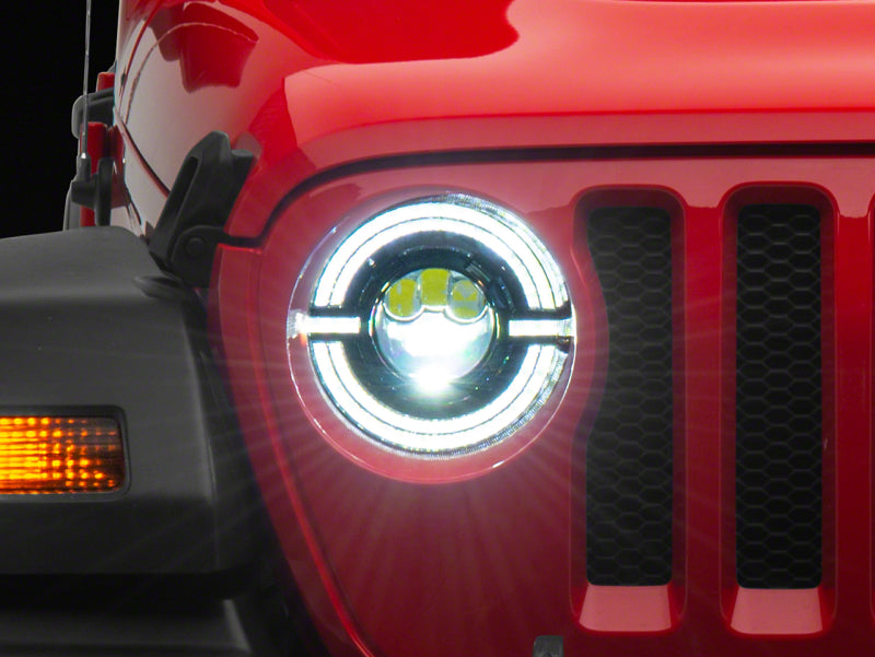 Load image into Gallery viewer, Raxiom 18-23 Jeep Wrangler JL Axial Series 9-In LED Angel Eye Headlights- Blk Housing (Clear Lens)
