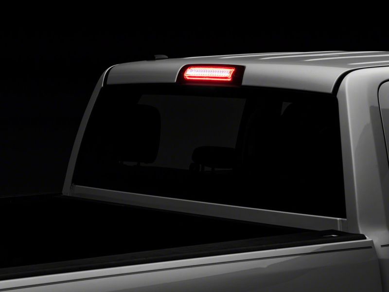 Load image into Gallery viewer, Raxiom 09-18 Dodge RAM 1500 10-18 Dodge RAM 2500/3500 Axial Series LED Third Brake Light- Red
