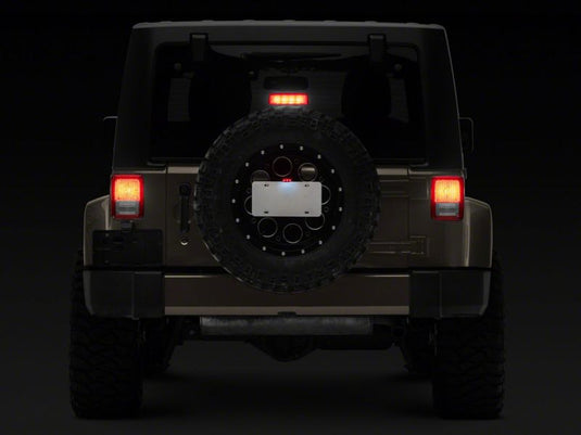 Raxiom 07-18 Jeep Wrangler JK Axial Series License Plate Bracket w/ LED Brake Light