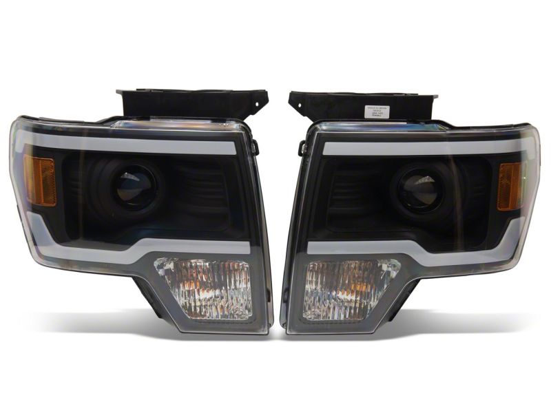 Load image into Gallery viewer, Raxiom 09-14 Ford F-150 Axial Series Projector Headlights w/ LED Light Bar- Blk Housing (Clear Lens)
