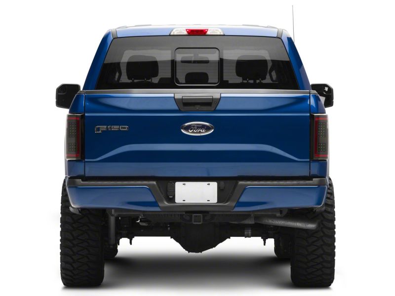 Load image into Gallery viewer, Raxiom 15-17 Ford F-150 LED Tail Lights w/ SEQL Turn Signals- Blk Housing (Clear Lens)
