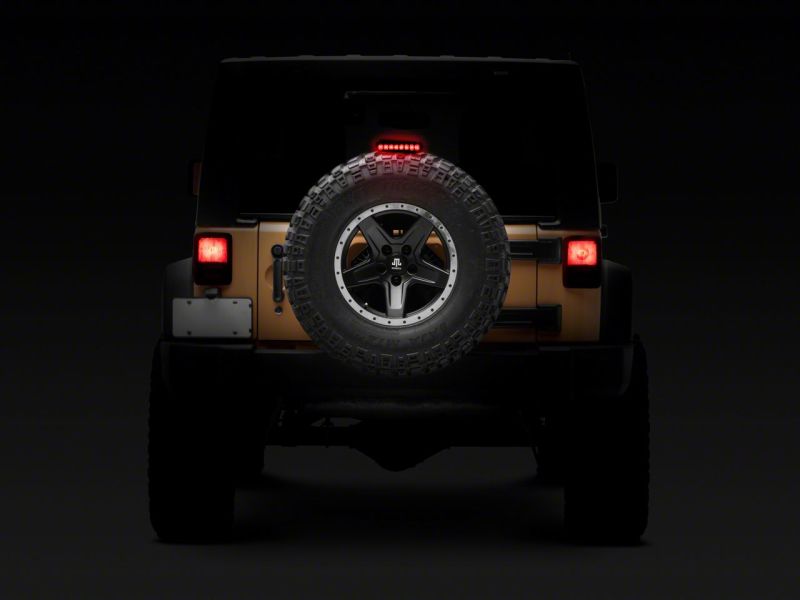 Load image into Gallery viewer, Raxiom 07-18 Jeep Wrangler JK Axial Series Hyper Flash LED Third Brake Light- Smoked
