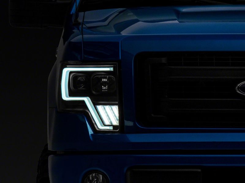 Load image into Gallery viewer, Raxiom 09-14 Ford F-150 Axial G4 Light Bar Switchback Projector Headlights- Blk Housing (Clear Lens)
