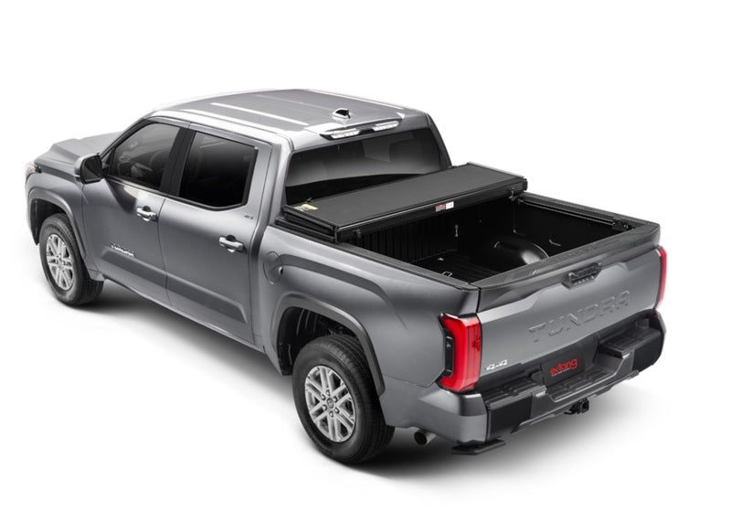 Load image into Gallery viewer, Extang 14-22 Toyota Tundra w/o Rail Sys. (5ft. 7in. Bed) Solid Fold ALX
