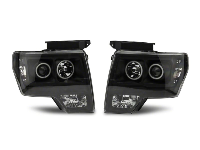 Load image into Gallery viewer, Raxiom 09-14 Ford F-150 Super White LED Halo Projector Headlights- Blk Housing (Clear Lens)
